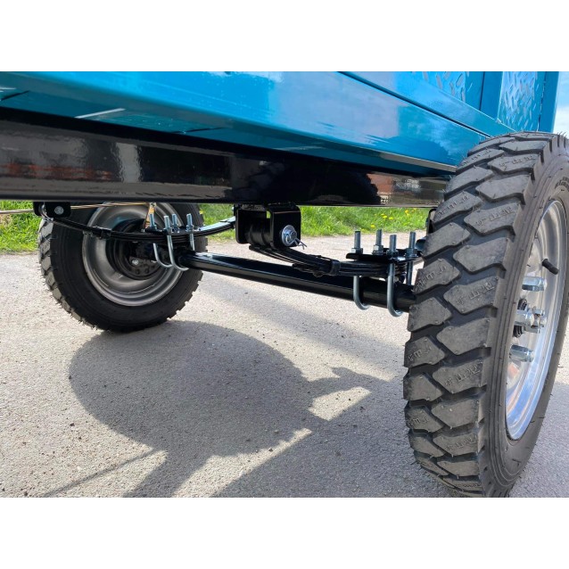 Trailer for tillers with springs